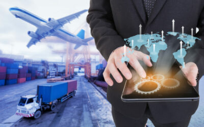 Image of businessman holding tablet ,Growing business concept on Global network coverage world map , Logistic Import Export background (Elements of this image furnished by NASA)
